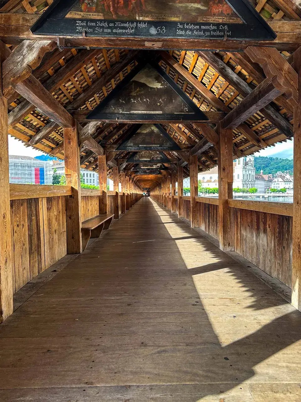 Inside Lucerne's historic wooden covered bridge