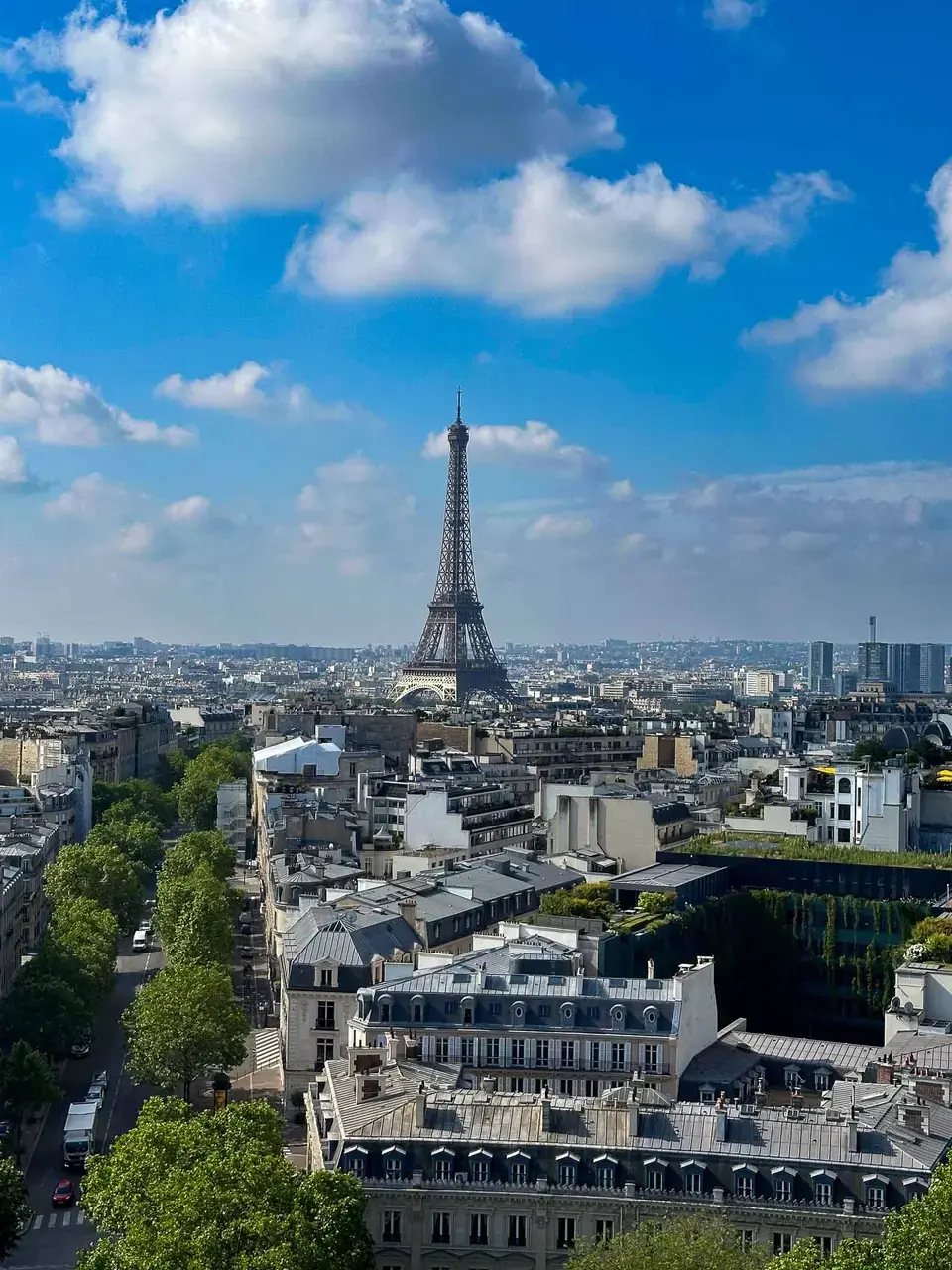 View over Paris rooftops toward the Eiffel Tower