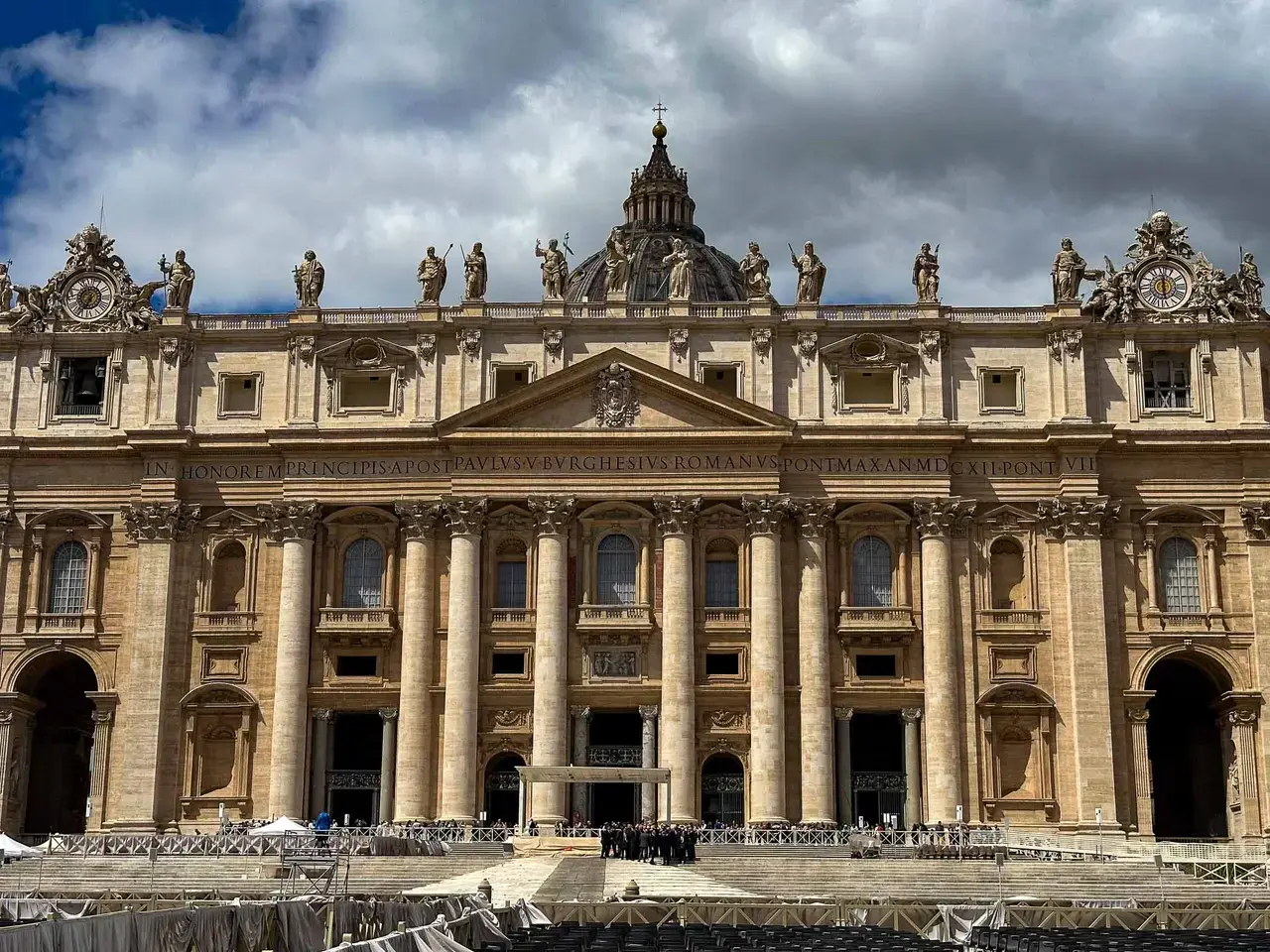 An ornate Baroque basilica facade with statues