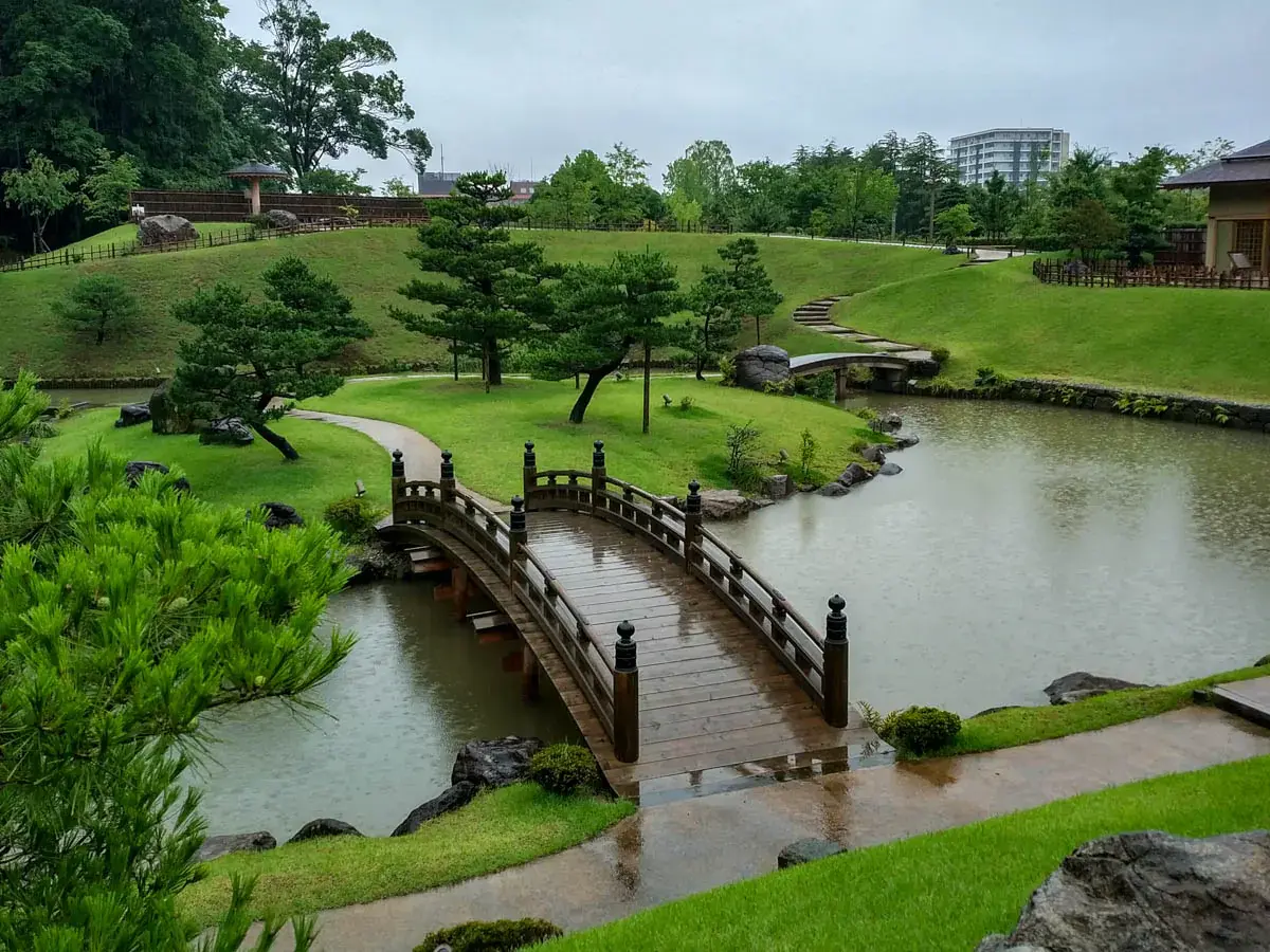 Photograph of an arched bridge in the gardens of Kanazawa Castle in Japan